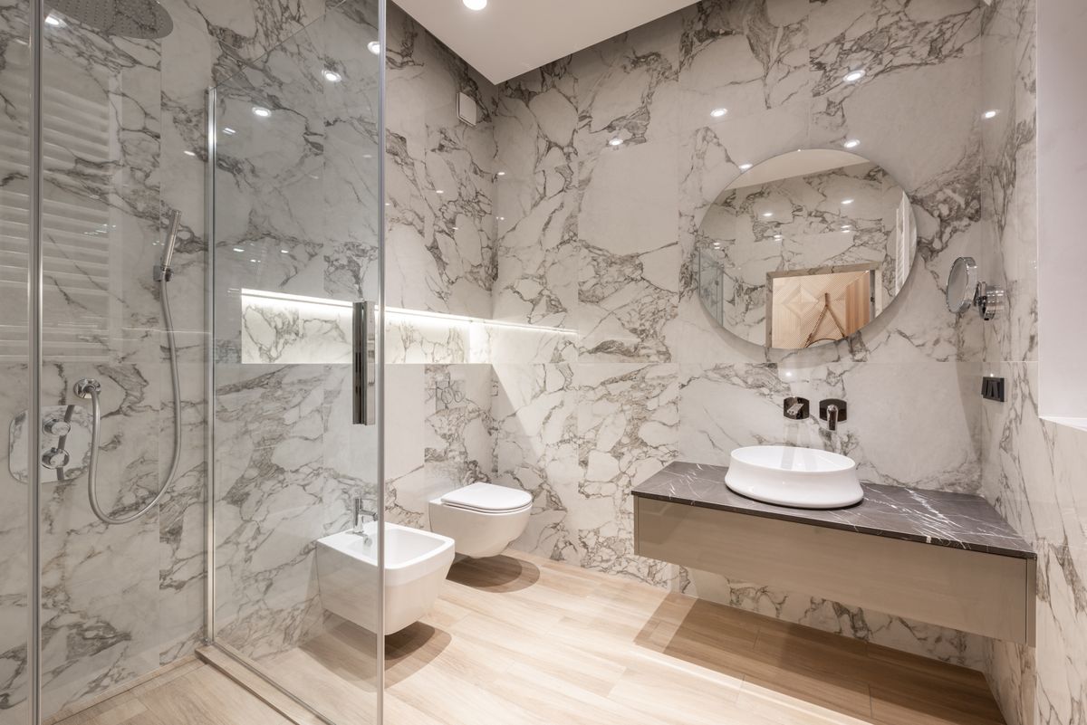 Bathroom with toilet, bidet, basin and shower