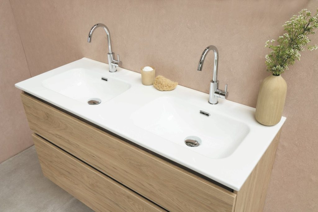 Double basin vanity unit with chrome mixer taps
