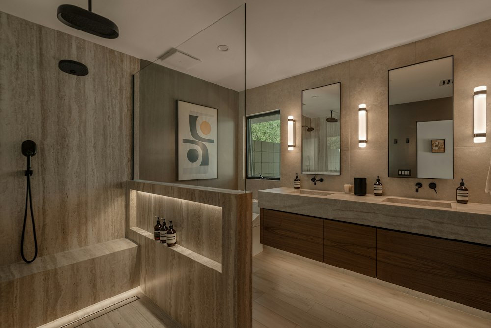 Fully renovated bathroom with walk-in shower and double vanity