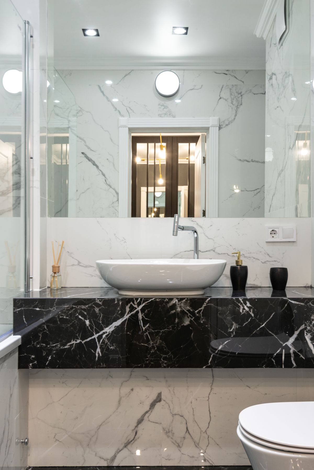Modern bathroom with black marble vanity