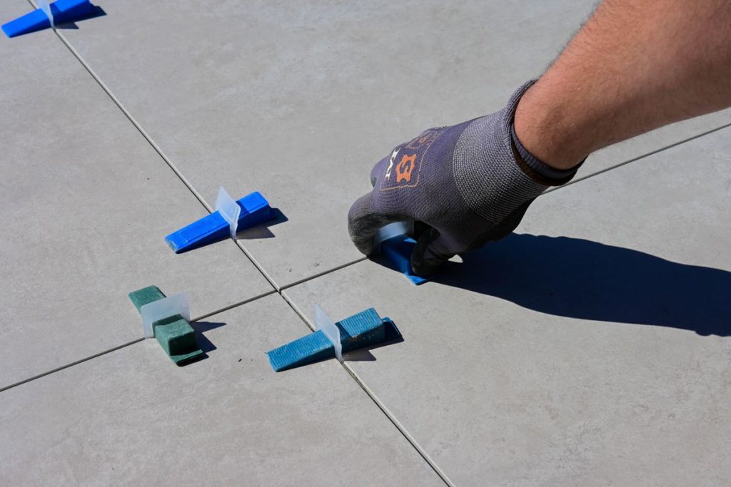 Tile spacers keeping grout lines even