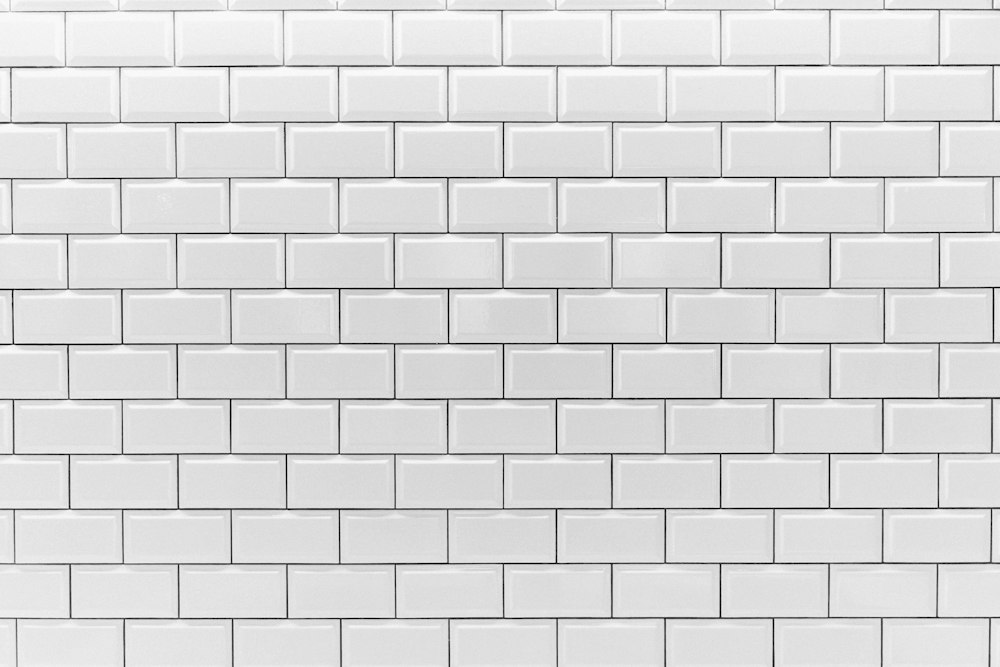 White subway tiles laid in a clean running bond